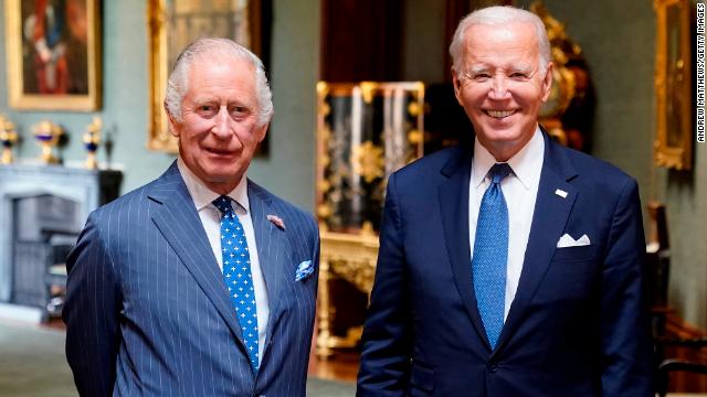 King Charles III and US President Joe Biden pose in the Grand Corridor at Windsor Castle on July 10, 2023 in Windsor, England.