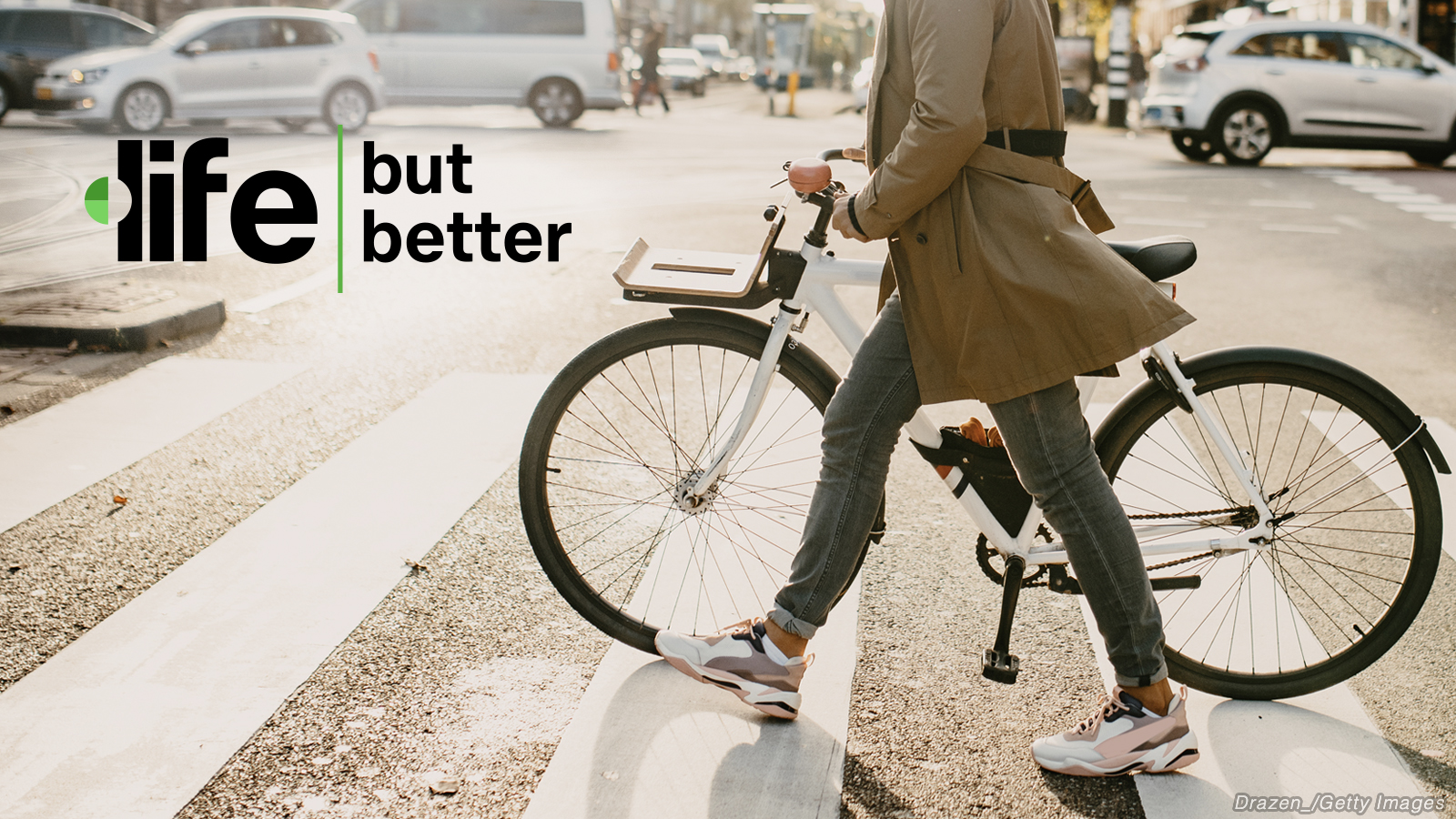 Life, but Better: Person walking across a crosswalk with their bicycle