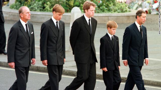 A young Prince Harry walks behind Princess Diana's hearse at her funeral.