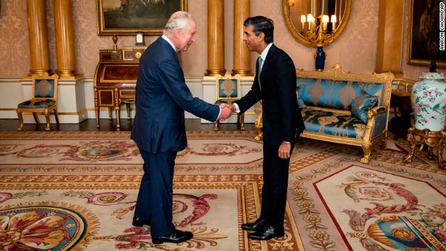 King Charles III shook hands with Rishi Sunak at Buckingham Palace.