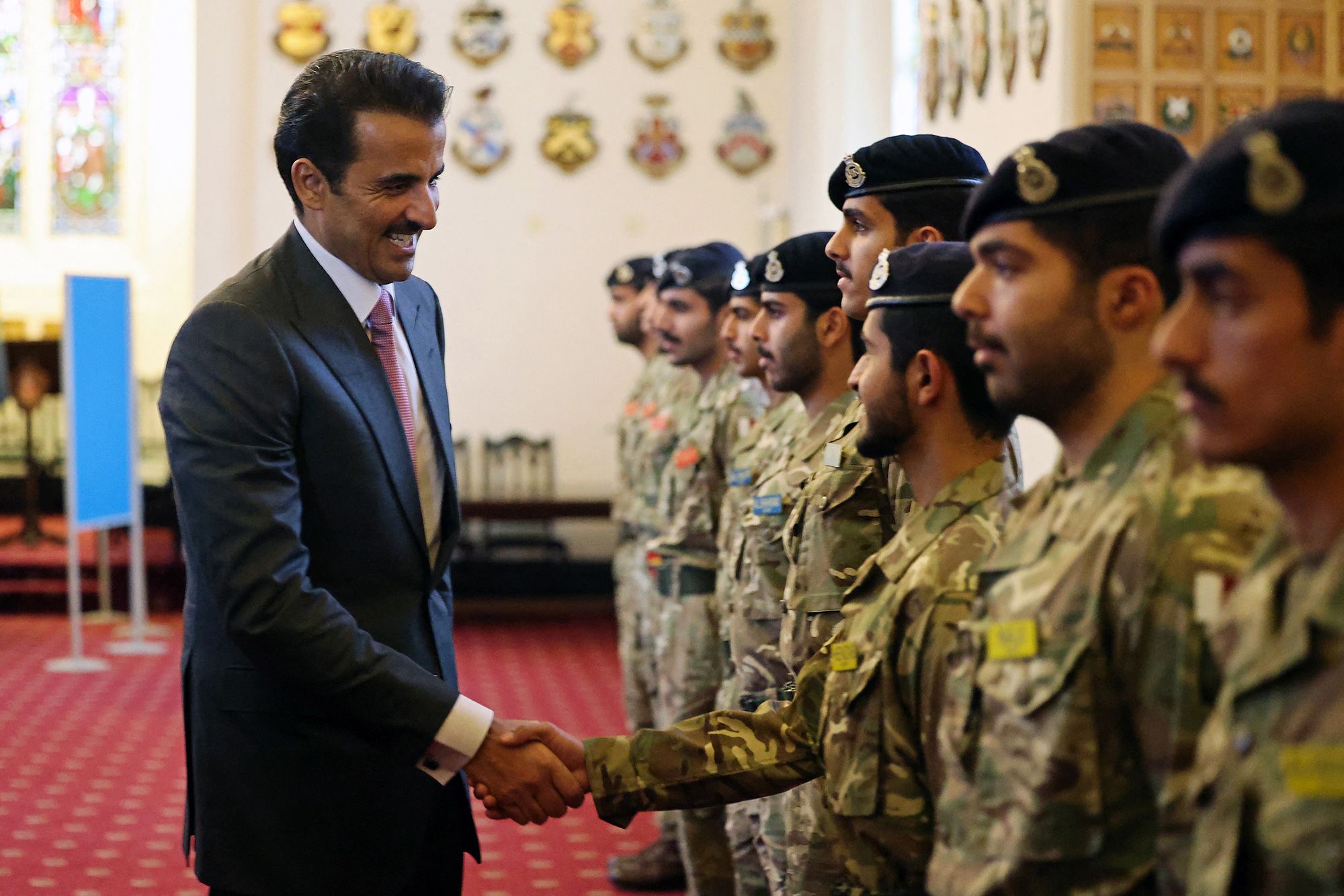 Qatar's Emir meets with Qatari cadets during a visit to he Royal Military Academy Sandhurst on 4th December 2024.