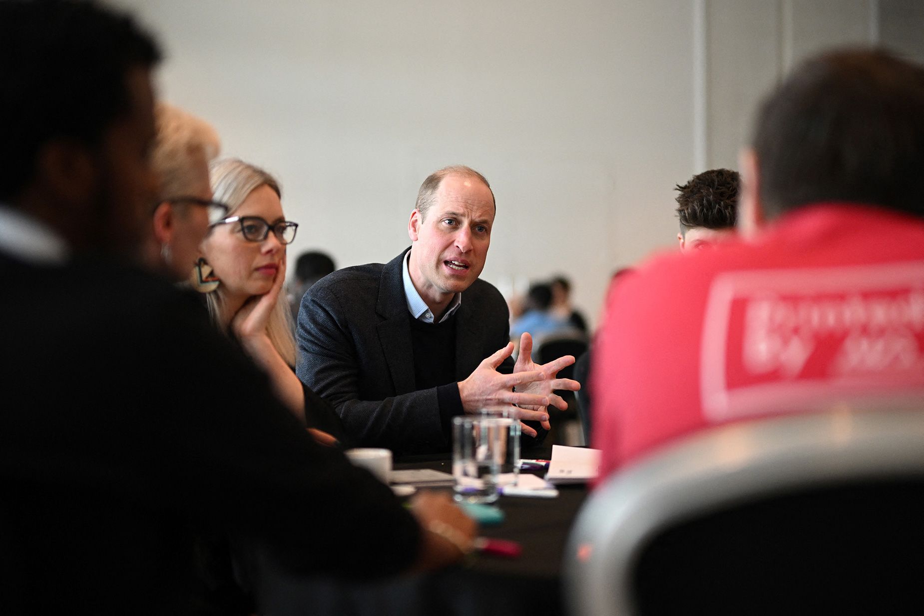 Prince William speaks at a meeting about homelessness.