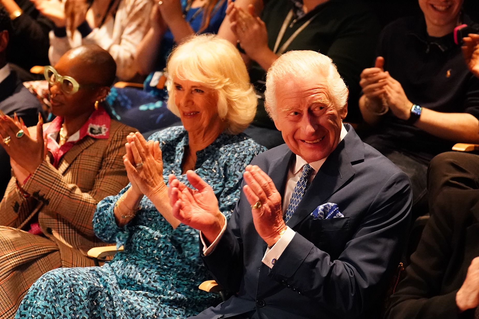 Photo of King Charles and Queen Camilla clapping