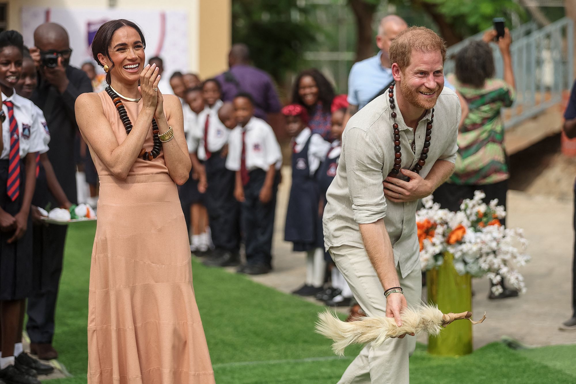 Prince Harry, Duke of Sussex, and Meghan, Duchess of Sussex, take part in activities in Nigeria