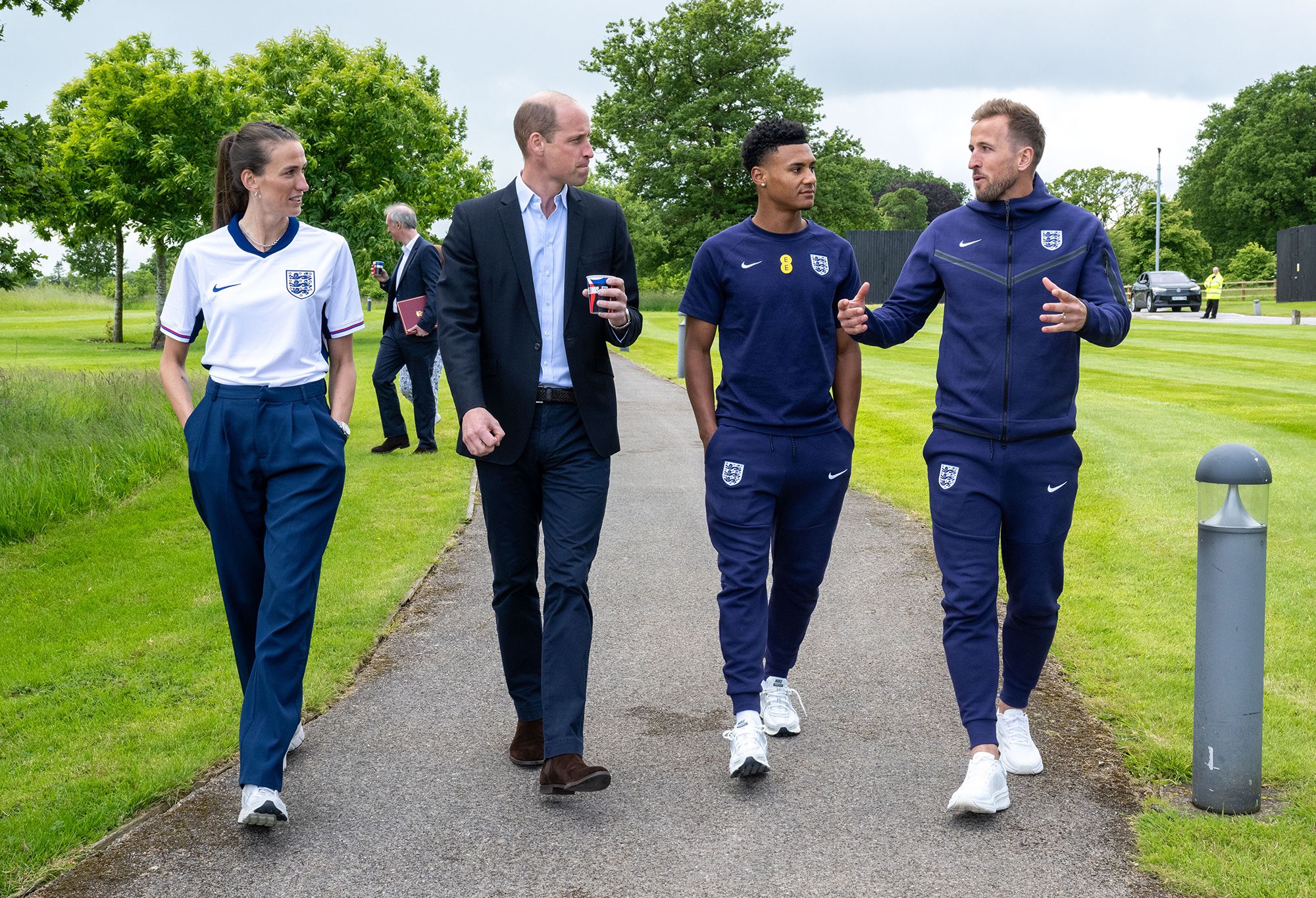 Photo of Prince William walking with England captain Harry Kane and others