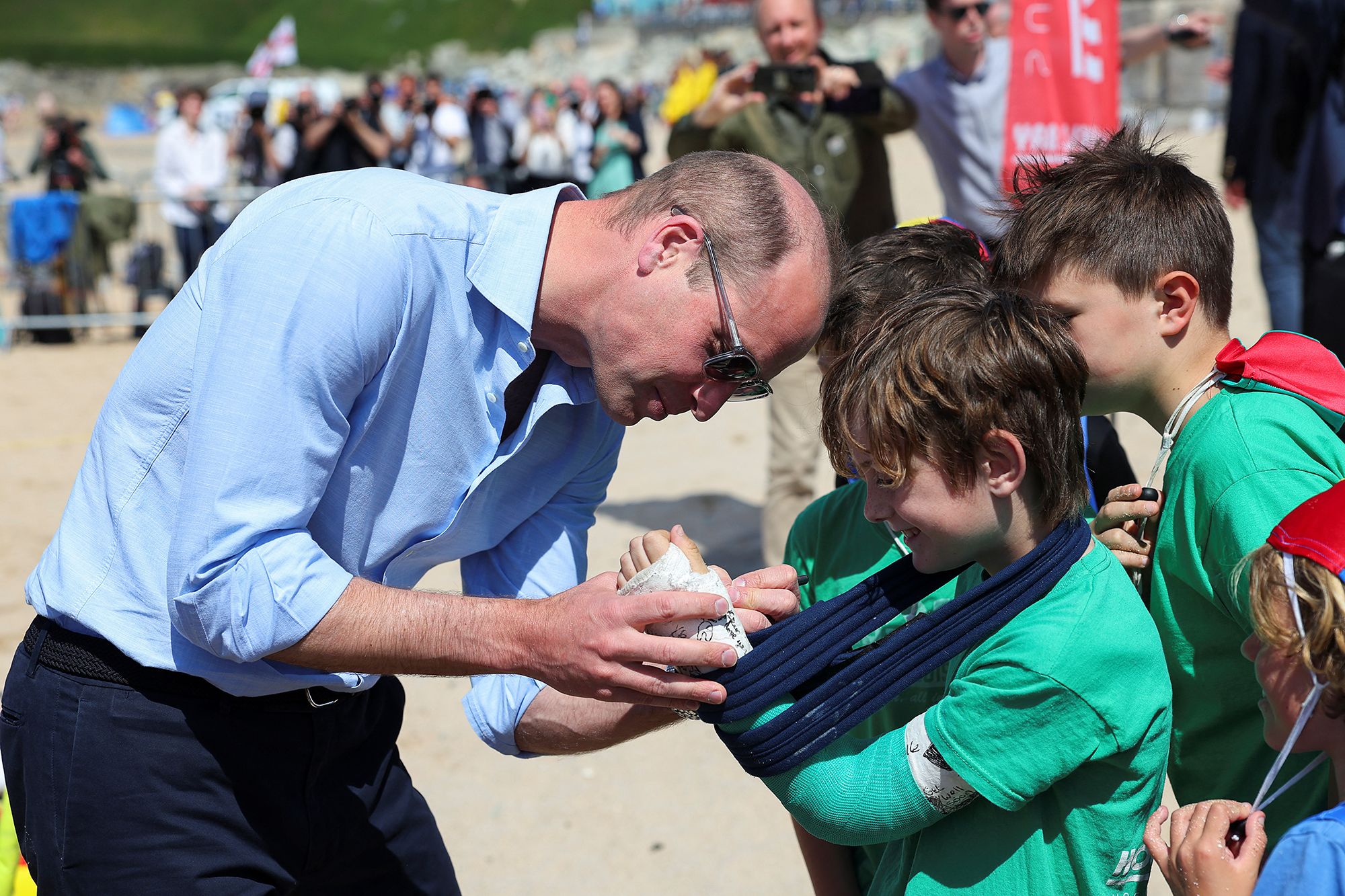 Prince William signing a cast