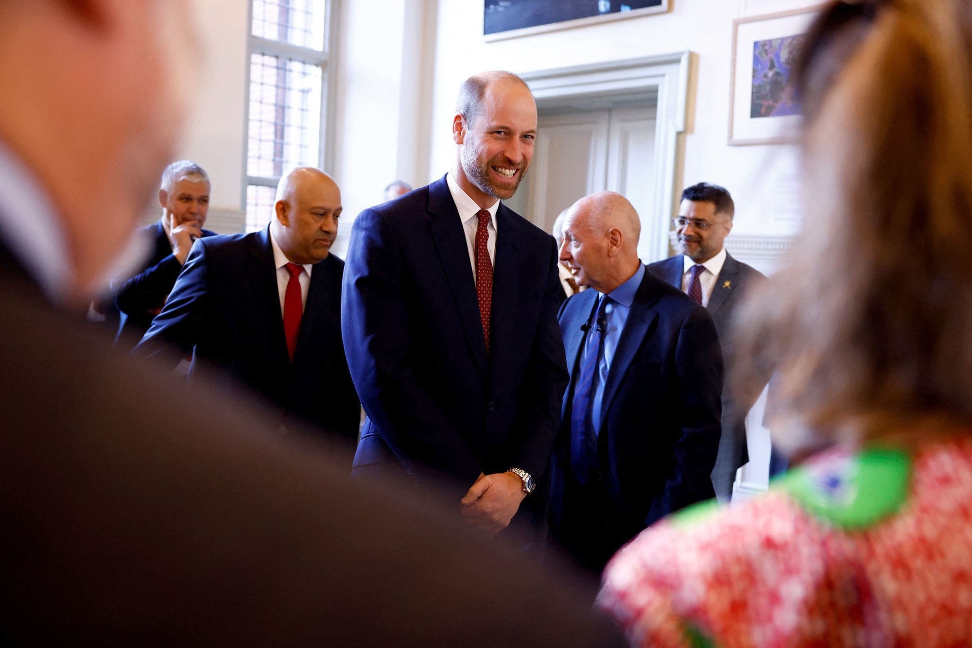  smiling Prince William, co-patron of the ''Jewel of Arabia Expedition'' attending the launch at the Royal Geographical Society, in London, on November 25, 2024.  