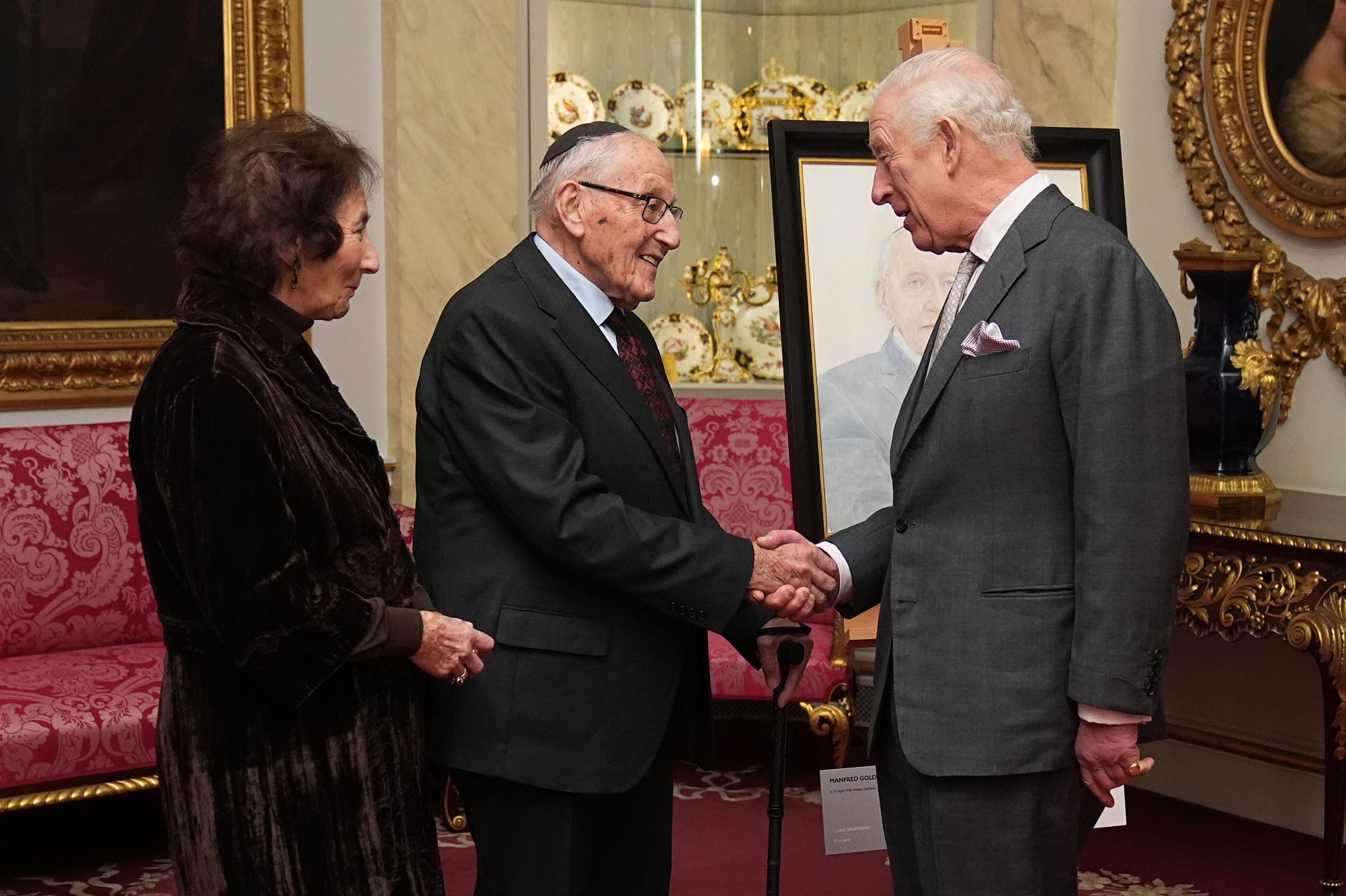 King Charles shakes the hand of Holocaust survivor Manfred Goldberg