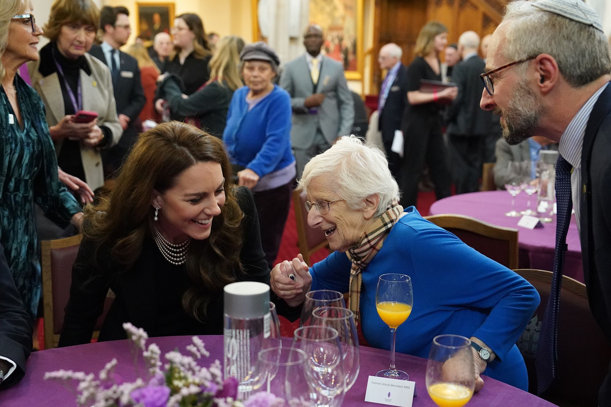 Kate talks with survivor Yvonne Bernstein at a ceremony to commemorate Holocaust Memorial Day 