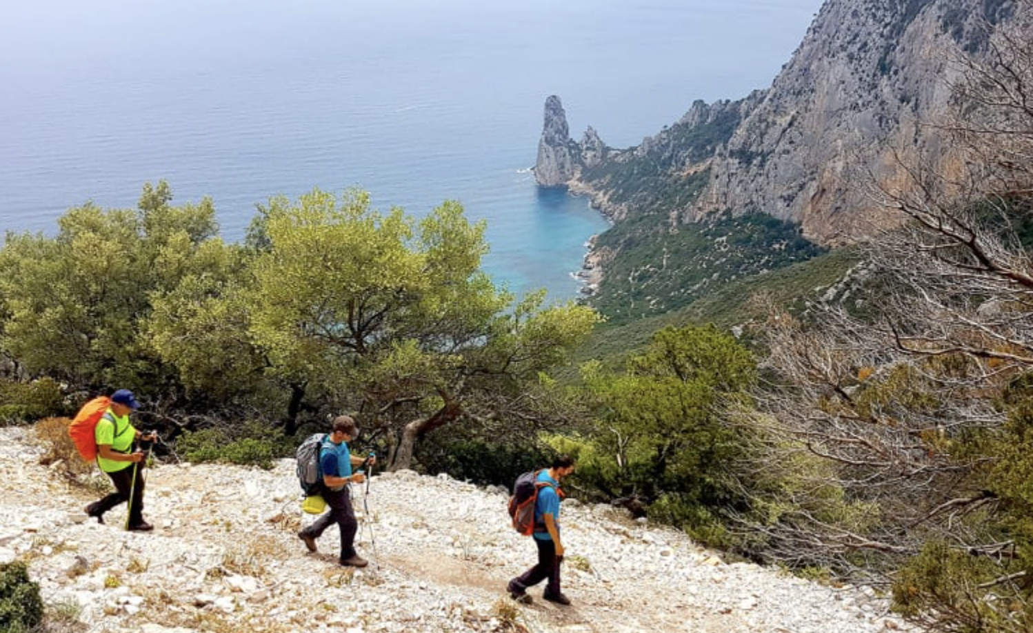 Vacationers hike the 100 Towers Path