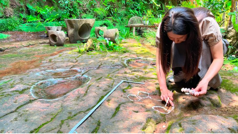The dinosaur footprints were spotted in the courtyard of a restaurant. 