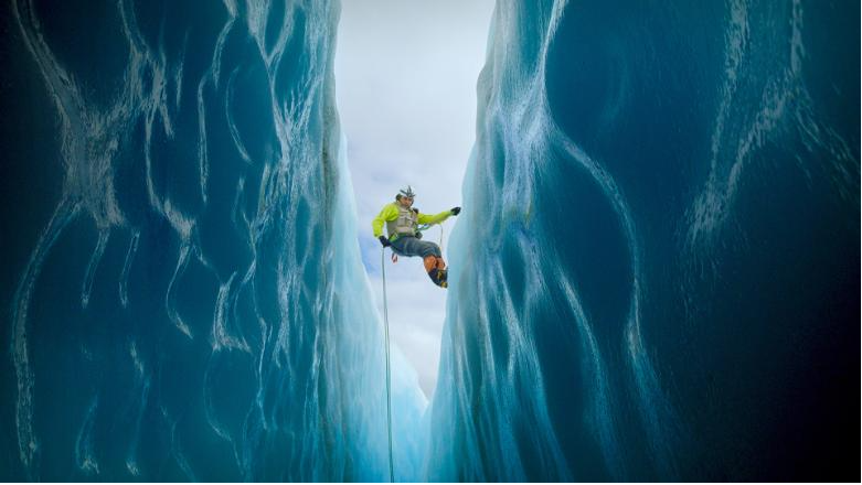 Biologist Isaí Madríz climbs inside a crevasse.