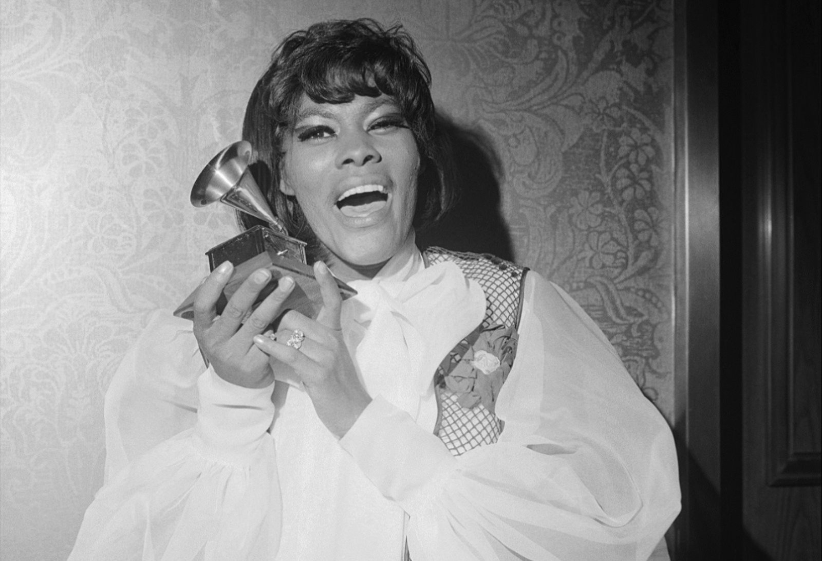 Warwick holds her Grammy Award after winning in the category of Best Female Contemporary Vocal Performance in 1969, for the song ''Do You Know The Way To San Jose.'' She is the first solo Black female artist to win in the category.