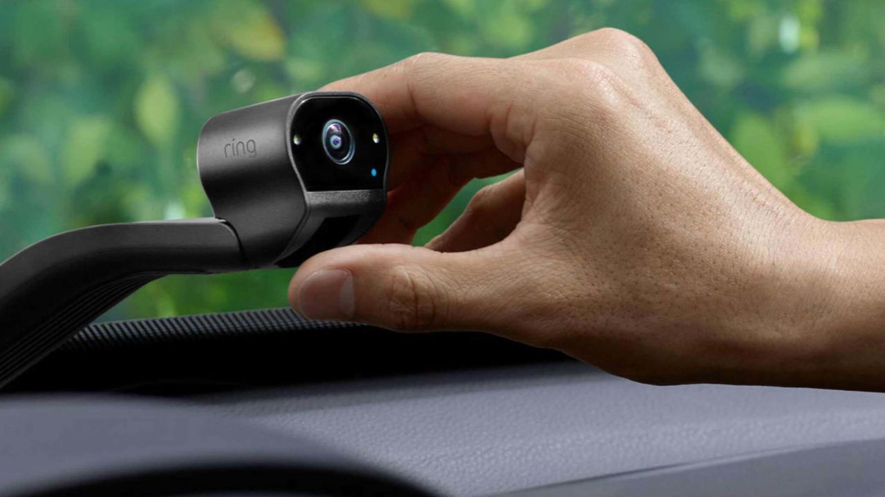 Person holding the Ring car camera
