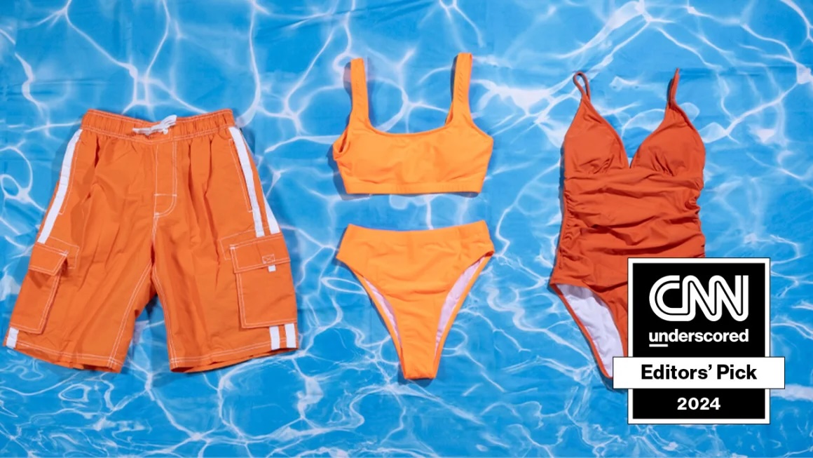 Three orange swimsuits against a pool backdrop