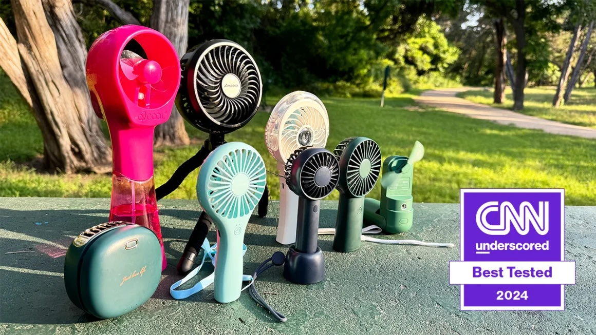 A row of multi-colored fans nestled outside