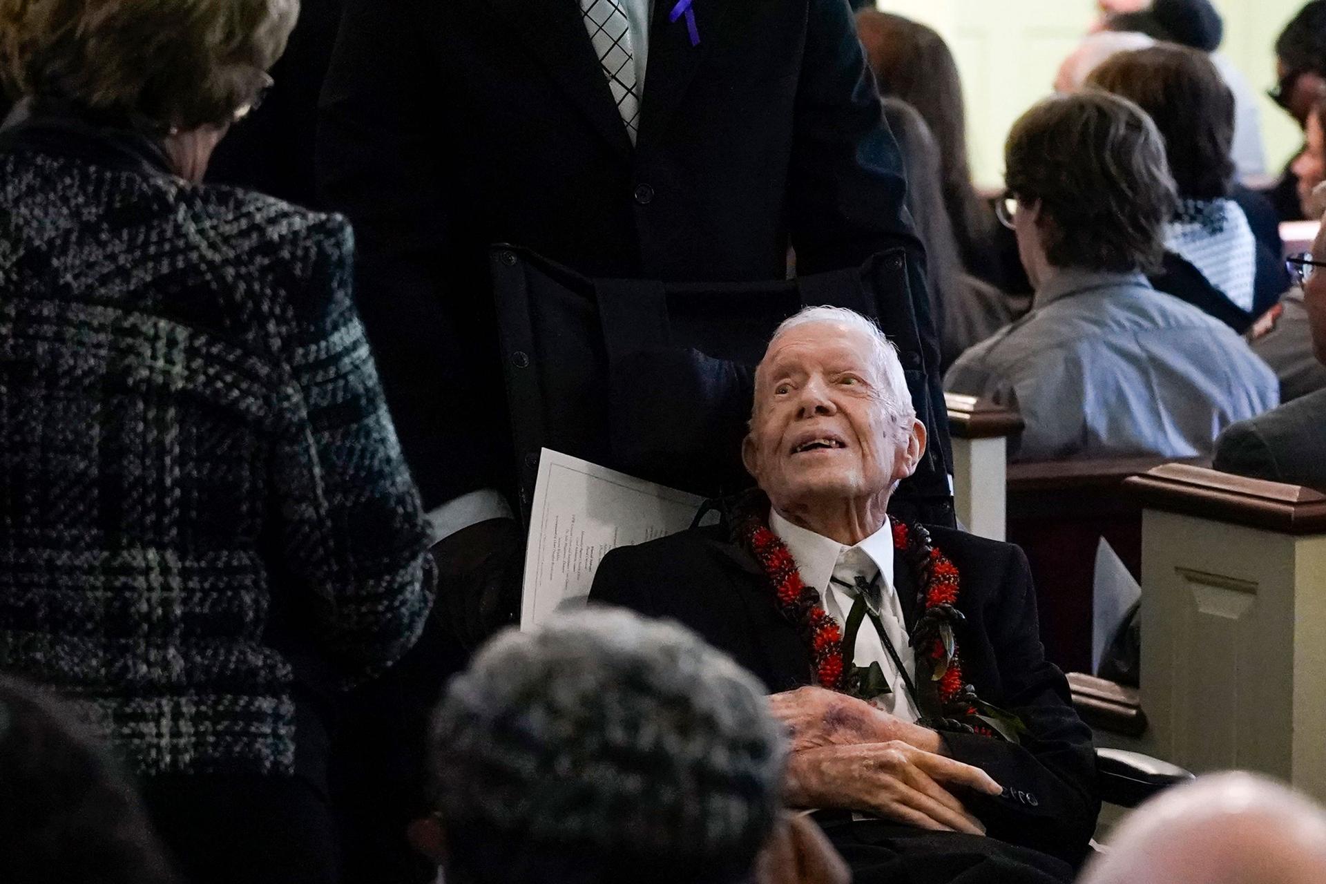 In this November 2023 photo, former President Jimmy Carter departs after the funeral service for former first lady Rosalynn Carter at Maranatha Baptist Church on November 29, 2023, in Plains, Georgia.