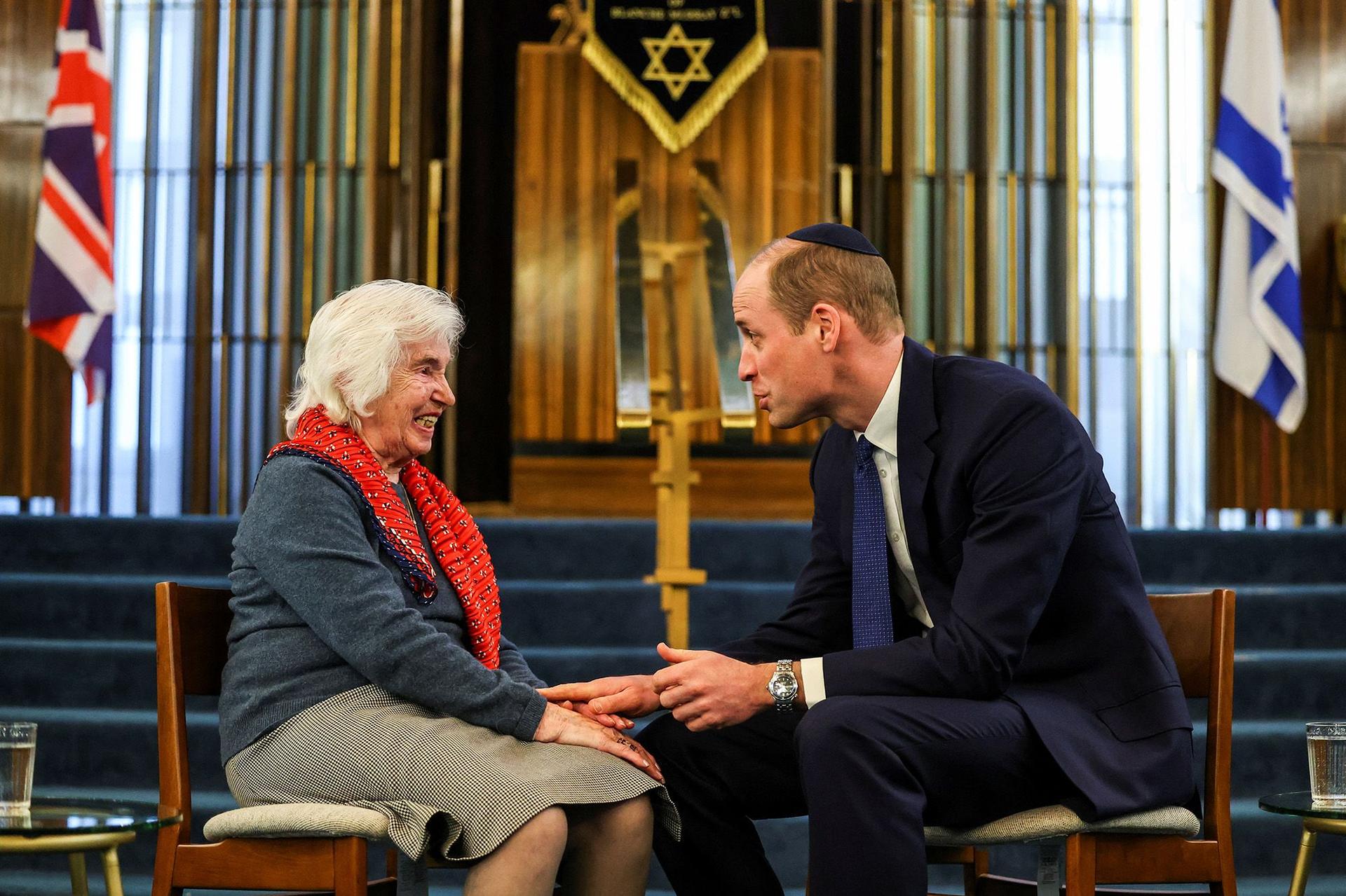 The Prince of Wales speaks with Renee Salt, 94, a Holocaust survivor, at the Western Marble Arch Synagogue on February 29 in London.