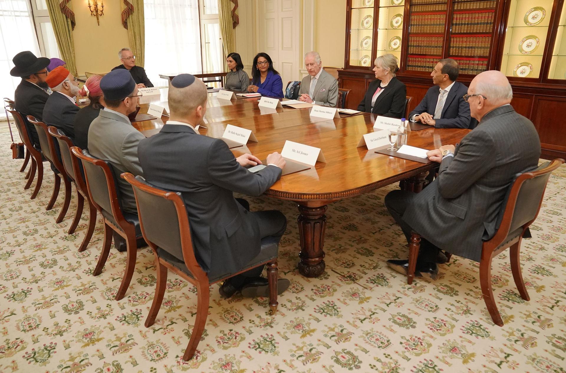 The King speaks with community faith leaders who have taken part in a Windsor Leadership Trust programme, encouraging and supporting dialogue, harmony and understanding at a time of heightened international tension at Buckingham Palace on Tuesday.