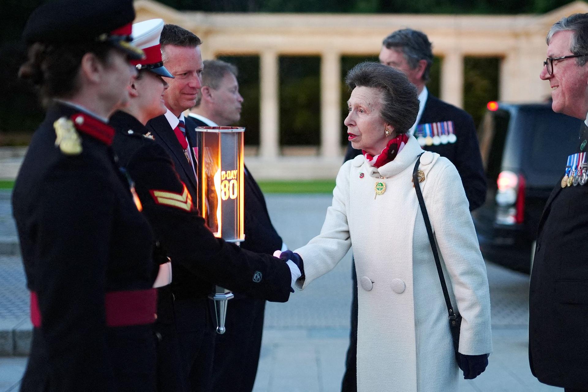 The Princess Royal meets Cadet Corporal Grace Maddison as she arrives at the Commonwealth War Grave Commission's Great Vigil at Bayeux War Cemetery, in Bayeux, Normandy, northwestern France.