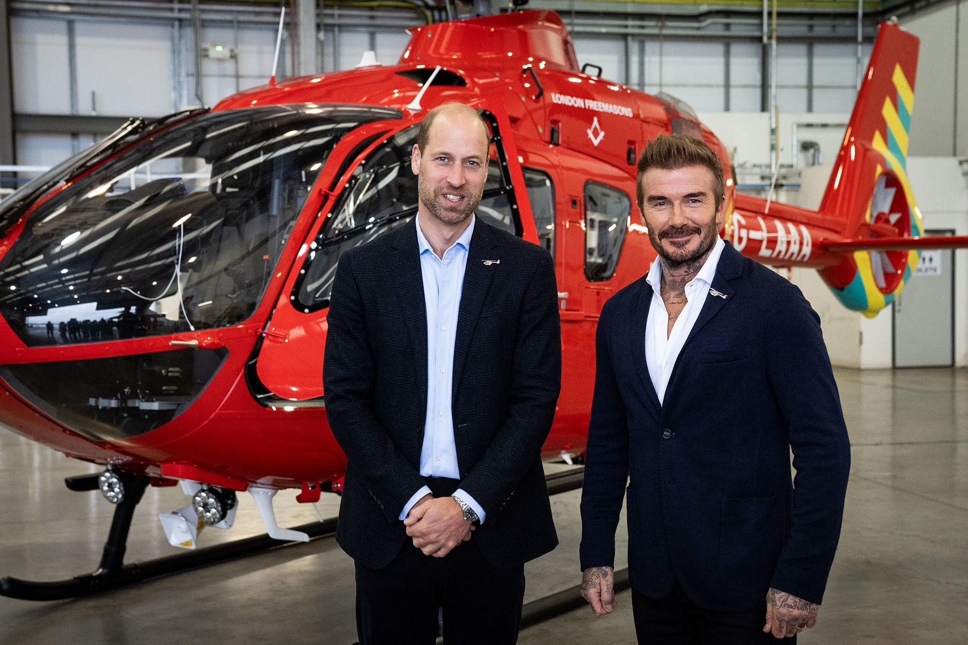 Prince William popped by RAF Northolt with soccer superstar David Beckham to check out two brand-new London Air Ambulance Charity choppers on Tuesday.