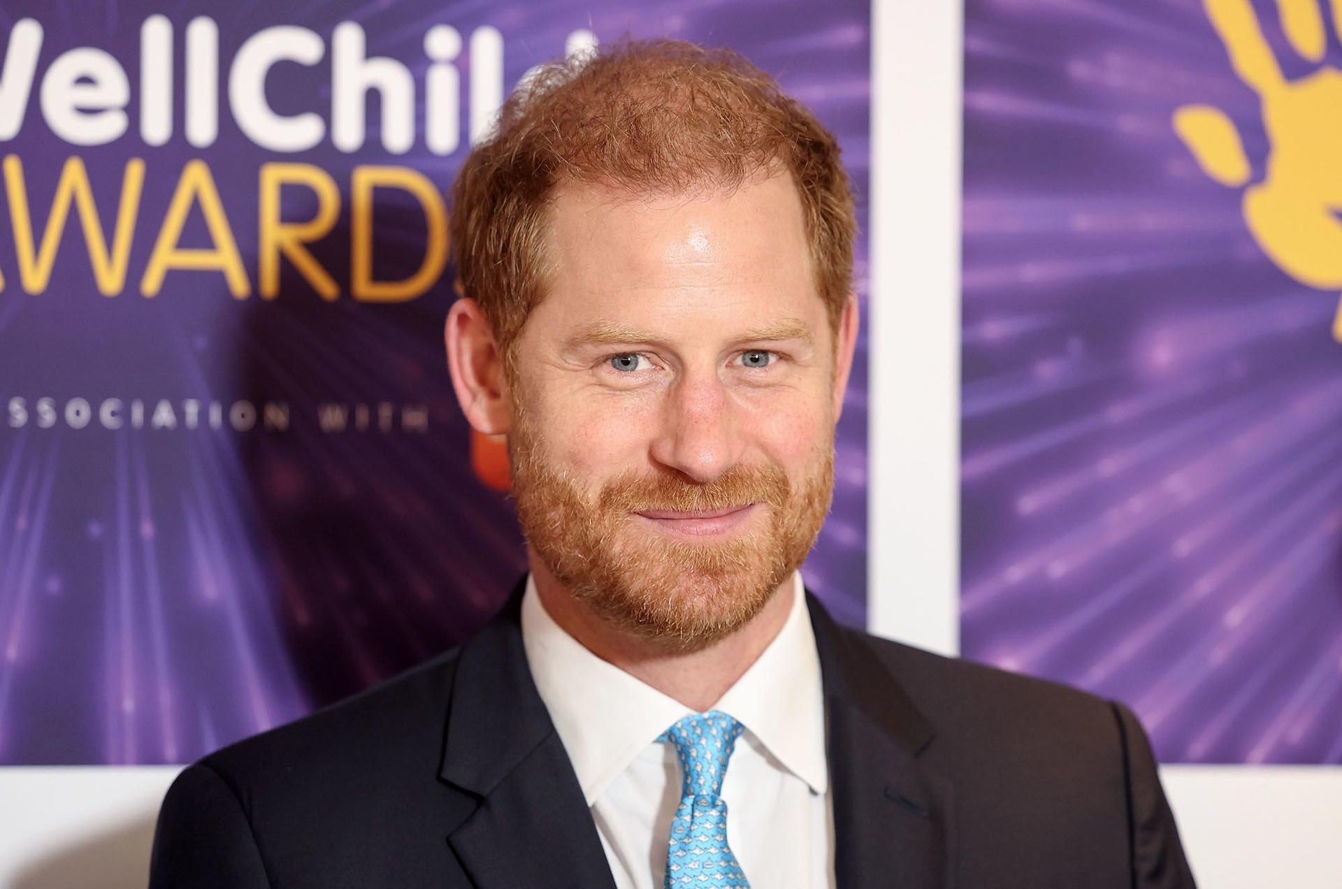 Prince Harry smiles before attending the WellChild awards in London on September 30.