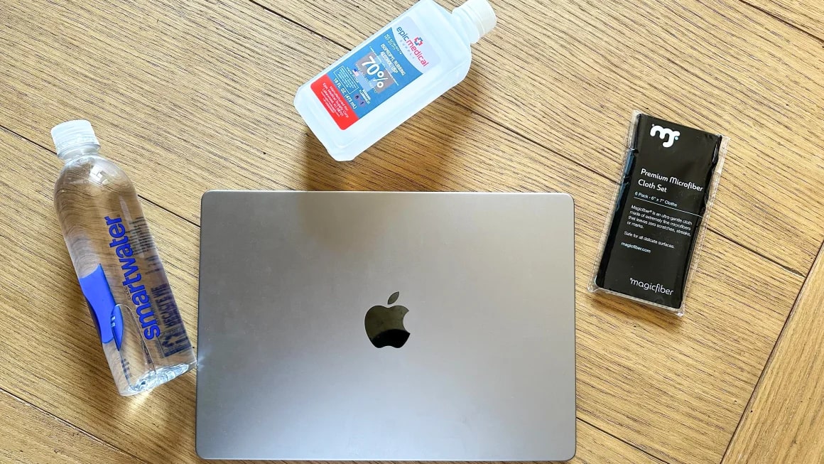 Laptop with cleaning products