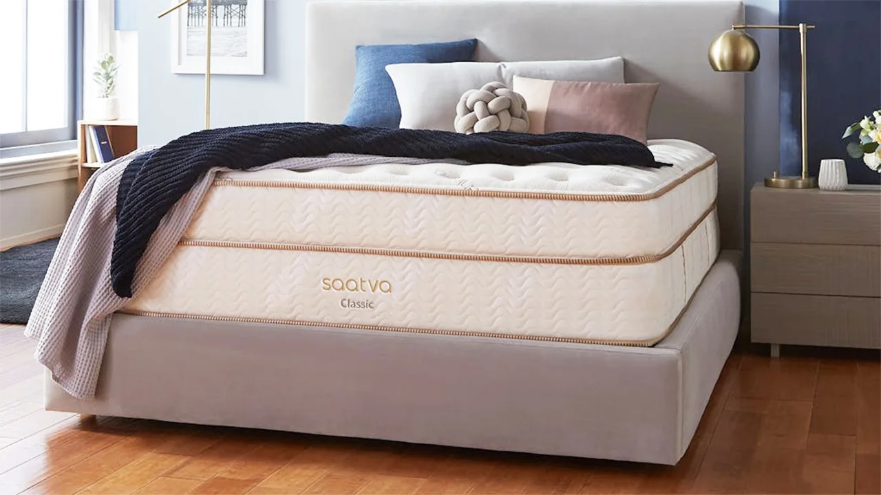 the classic saatva mattress in a brightly lit bedroom