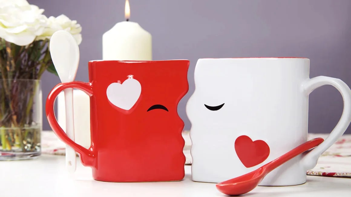 Two red and white mugs