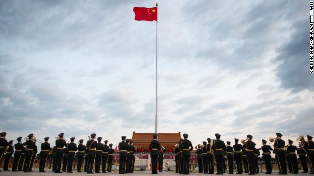 A flag-raising ceremony celebrating the 72th founding anniversary of the People's Republic of China is held on Beijing's Tiananmen Square on October 1.