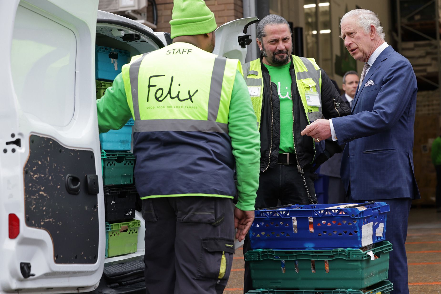 The King talks to staff during a visit to the London-based food charity, the Felix Project. 