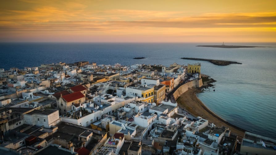 Farther round Italy's heel, Gallipoli offers an attractive crescent of sand overlooked by a historic fortress.