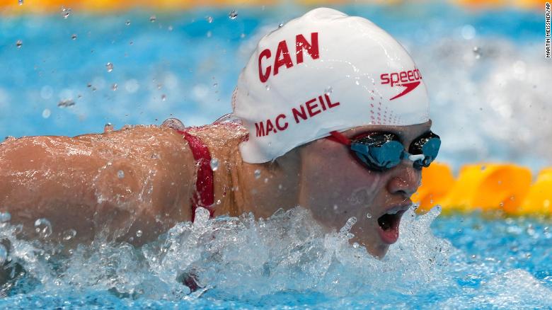 Canada's Margaret Macneil won the gold medal in the women's 100-meter butterfly at the Tokyo Olympics.