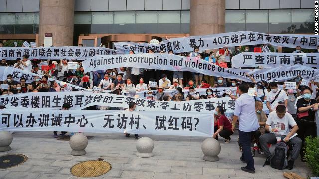 Hundreds of Chinese depositors staged a protest Sunday in the central city of Zhengzhou to demand their live savings back from several local banks.