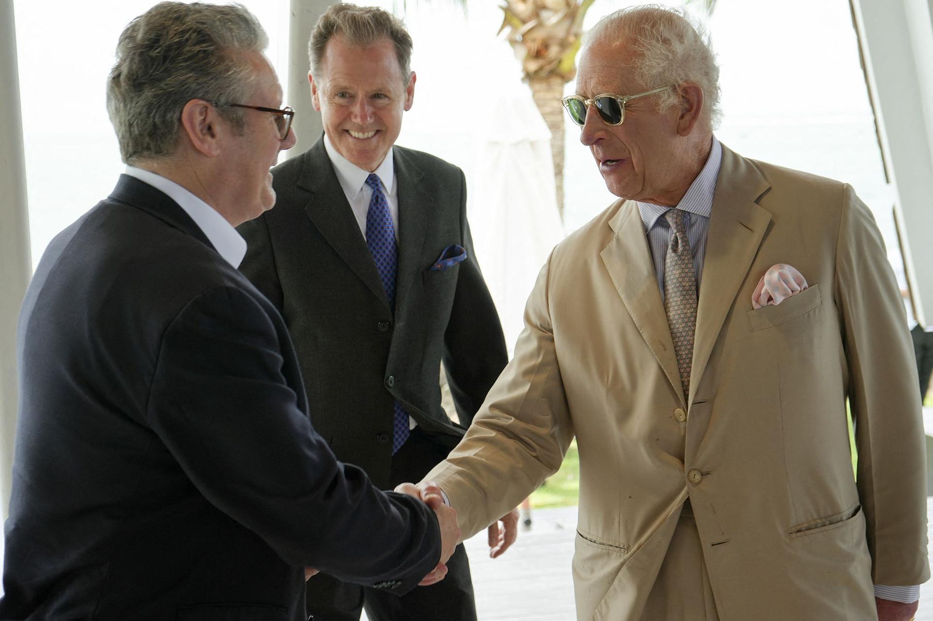 Photo of King Charles being greeted by Australian officials