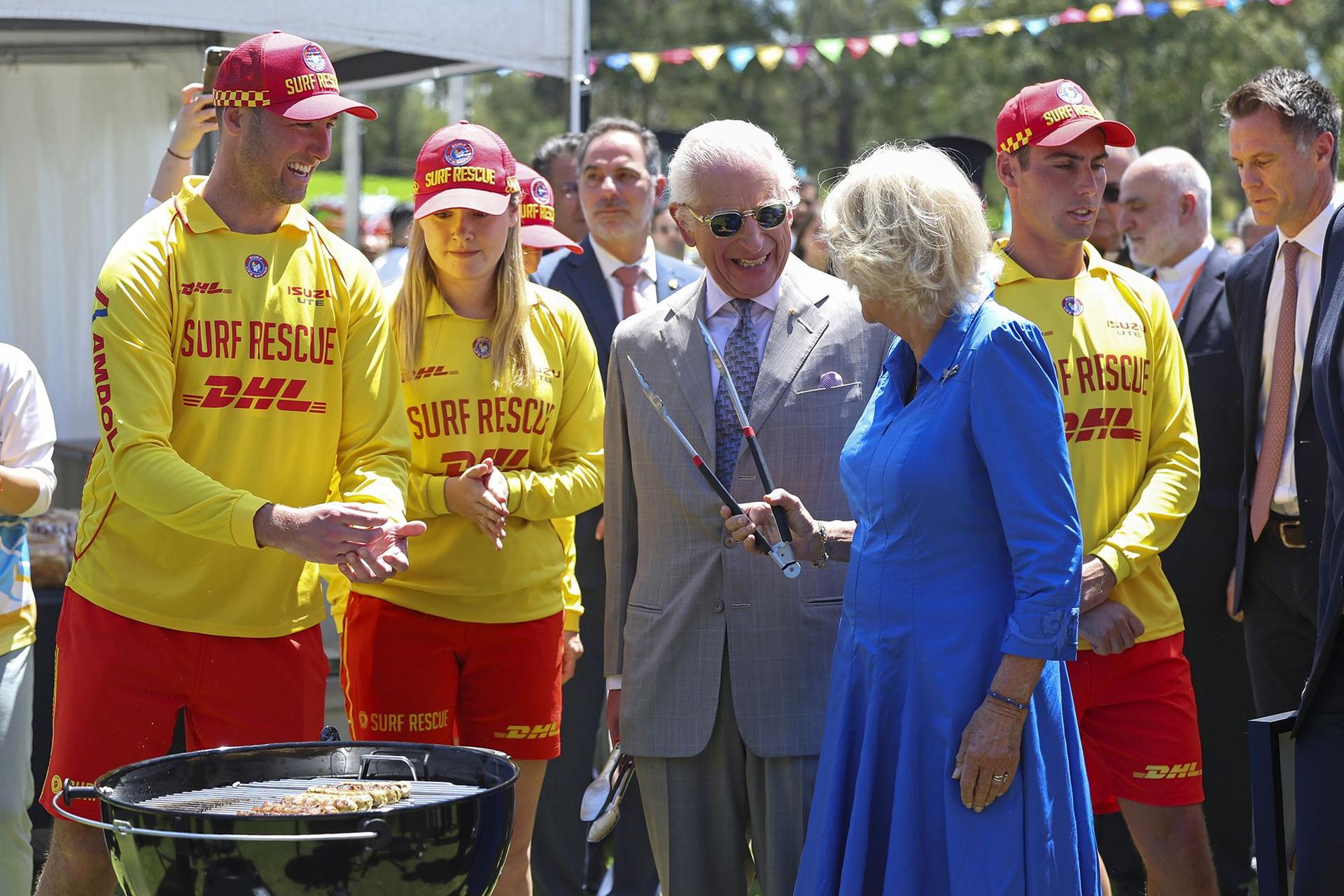 The royal couple take part in a true Aussie staple, grabbing the tongs and popping a couple of sausages on the barbie while at Parramatta Park on Tuesday.