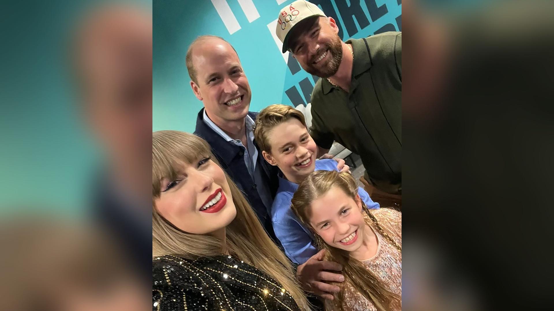 Prince William and his children Prince George and Princess Charlotte pose for a selfie with Taylor Swift and Travis Kelce, backstage during Swift's Eras Tour in London, June 2024